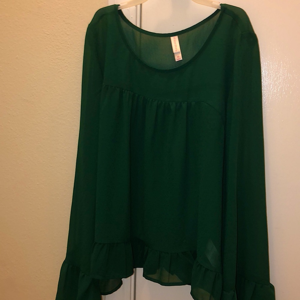 Green long sleeved top